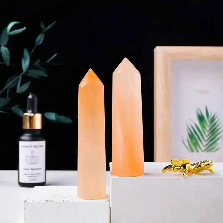 Polished Orange Selenite Tower with a silky, glowing peach finish, perfect for sacral chakra healing and creative energy.
