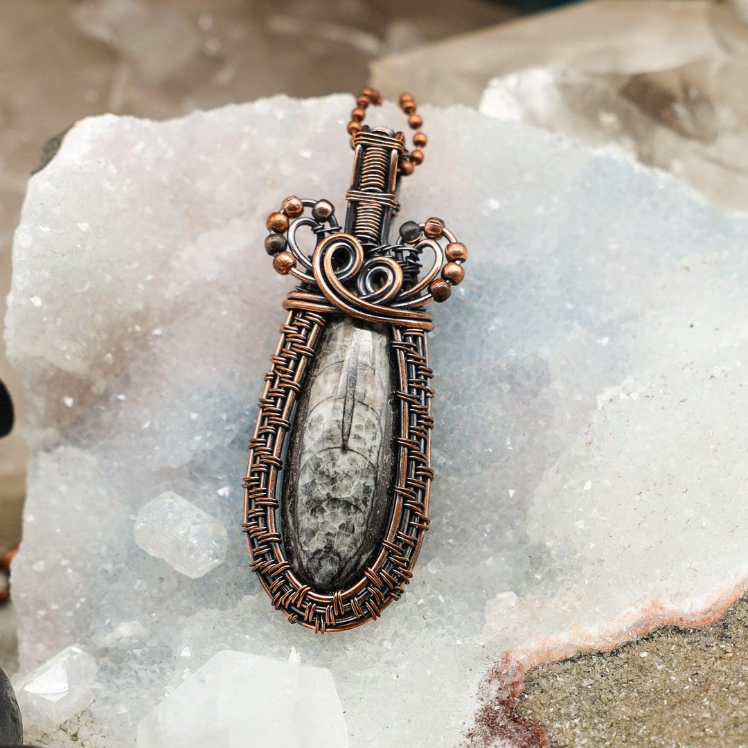 Orthoceras Fossil Wire Wrap Crystal Pendant: 3" ancestral fossil in handcrafted healing copper wire.