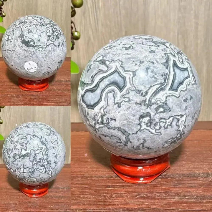 Polished Picasso Jasper Sphere with abstract gray, black, brown, and cream patterns, promoting creativity and grounding.