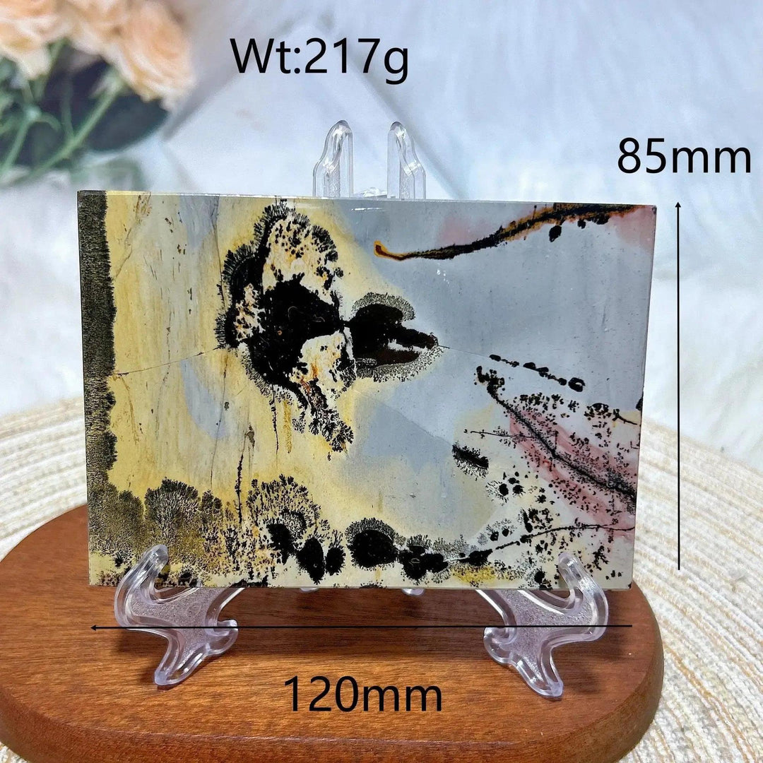 Crystal Destiny's Picture Jasper slab, a unique landscape of earthy tones, black, and subtle pink, 120x85mm.