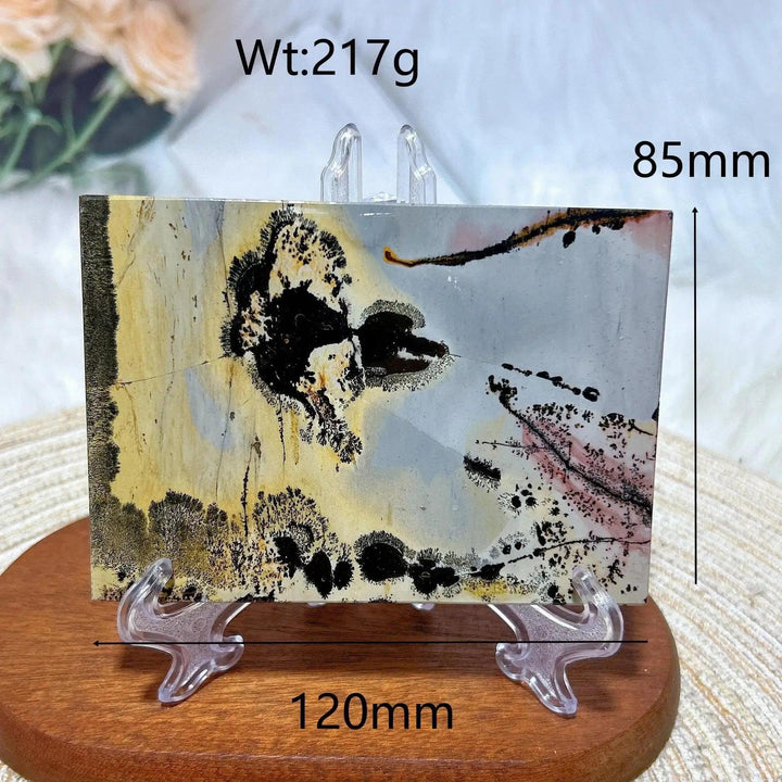 Crystal Destiny's Picture Jasper slab, a unique landscape of earthy tones, black, and subtle pink, 120x85mm.
