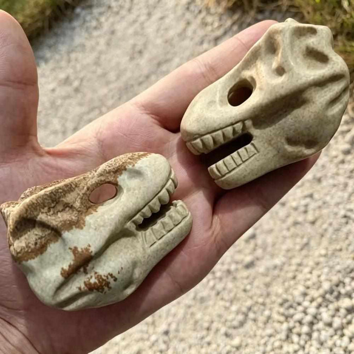 Hand-carved Picture Jasper dinosaur head with earthy tan and brown patterns for grounding and creative inspiration.