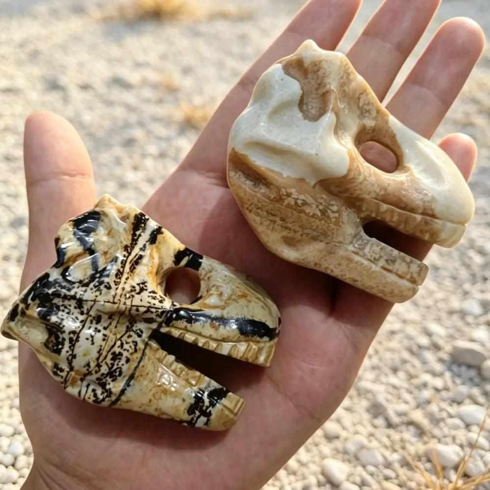 Hand-carved Picture Jasper dinosaur head for grounding, featuring earthy tan and brown landscape patterns in natural stone.