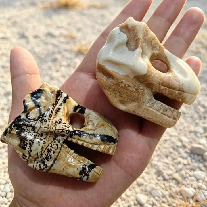 Hand-carved Picture Jasper dinosaur head for grounding, featuring earthy tan and brown landscape patterns in natural stone.