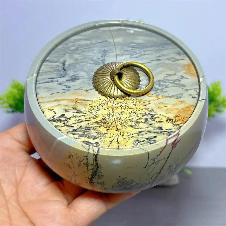 Hand-carved Picture Jasper Lidded Bowl with unique desert tones and a brass ring pull, perfect for sacred objects.