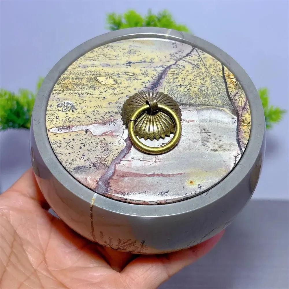 Hand-carved Picture Jasper Lidded Bowl with unique desert tones and a brass ring pull, perfect for sacred objects.