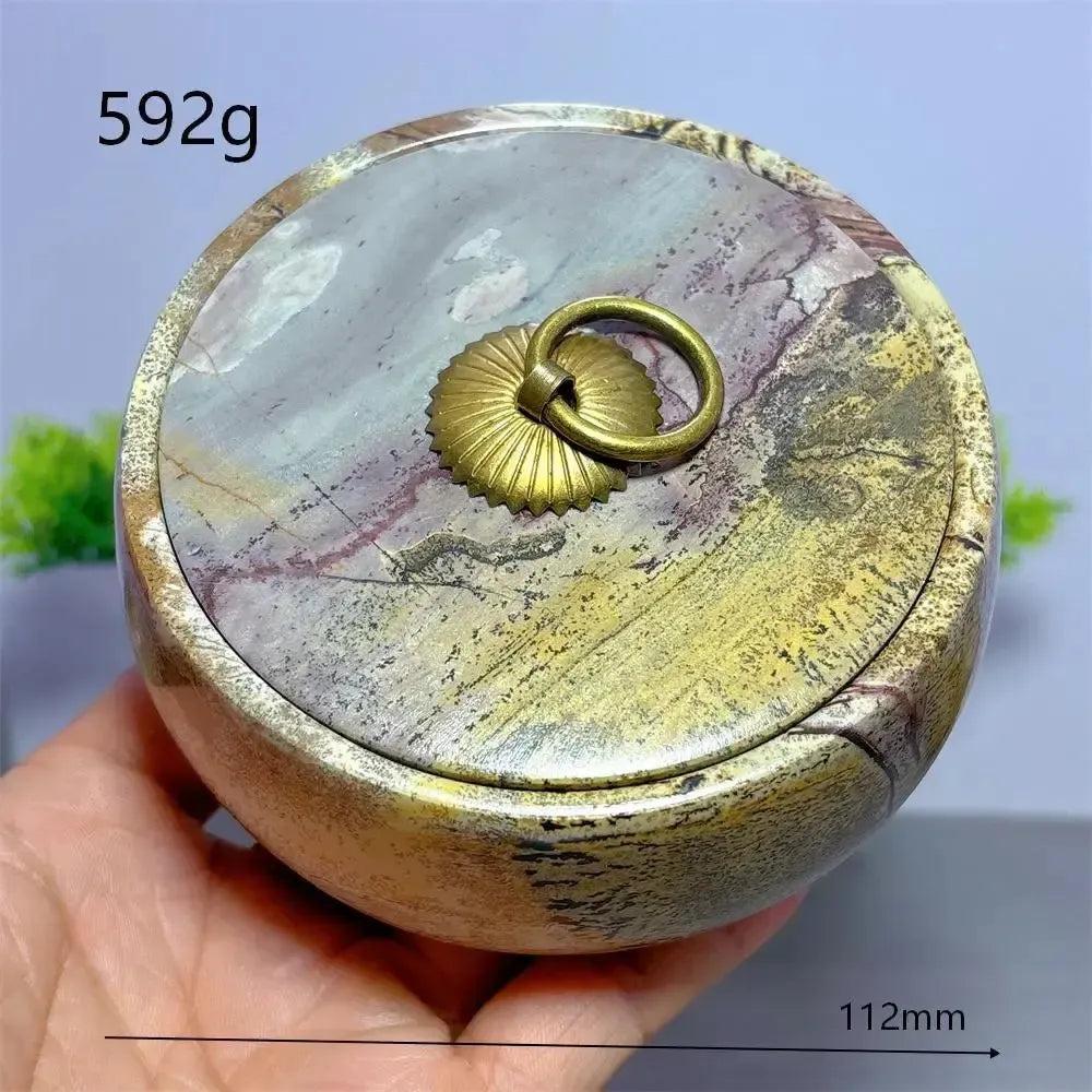 Hand-carved Picture Jasper Lidded Bowl with unique desert tones and a brass ring pull, perfect for sacred objects.