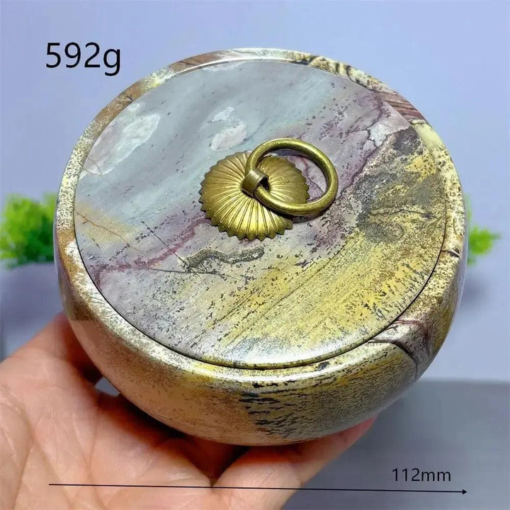 Hand-carved Picture Jasper Lidded Bowl with unique desert tones and a brass ring pull, perfect for sacred objects.