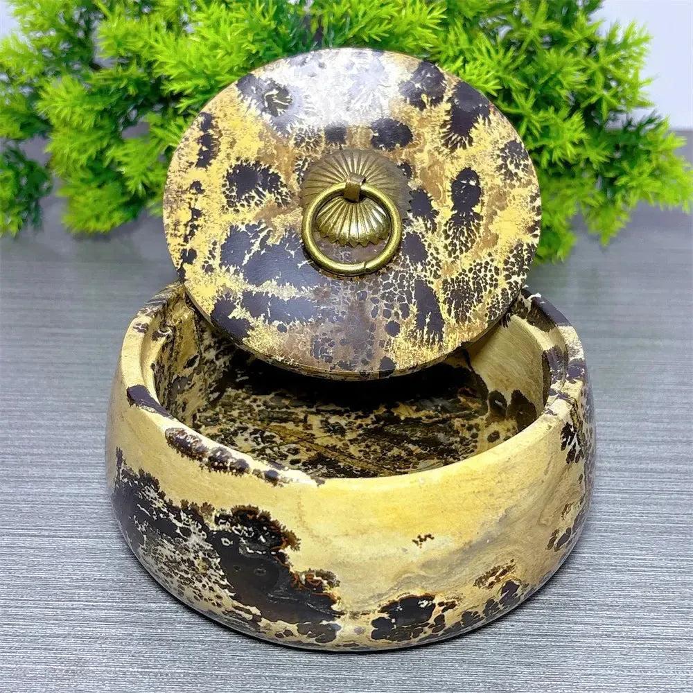 Hand-carved Picture Jasper lidded bowl with a brass ring handle, featuring earthy brown and tan landscape patterns.