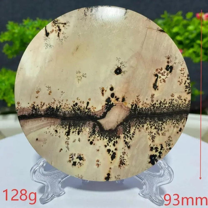 Round Picture Jasper slab from Crystal Destiny, featuring natural landscape patterns in cream, brown, and black.