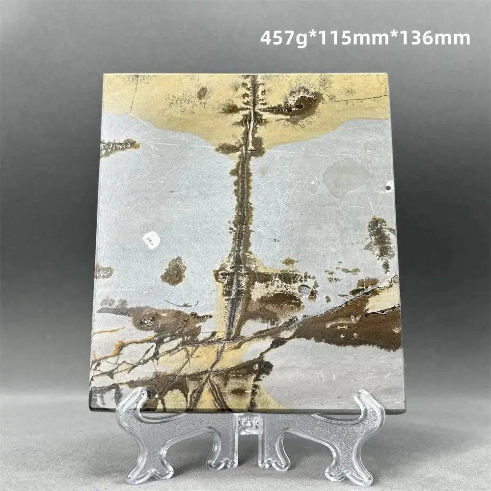 Polished Picture Jasper slice with unique brown, cream, and grey landscape patterns on a clear stand from Crystal Destiny.