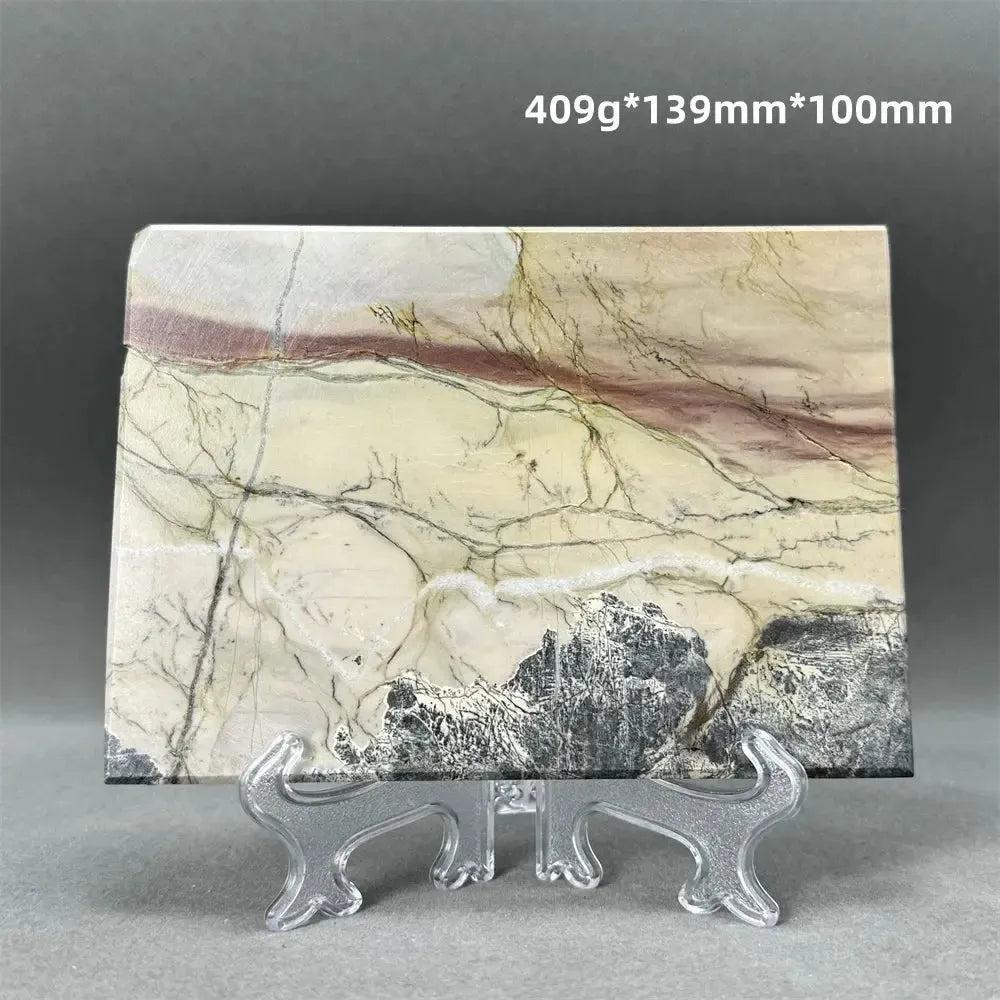 Polished Picture Jasper slice with natural landscape patterns in cream, brown, and ochre, displayed on a stand from Crystal Destiny.