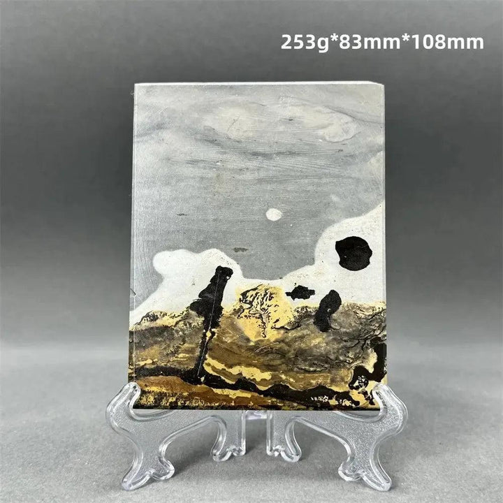 Polished Picture Jasper slice with natural landscape patterns in grey, cream, ochre, and brown, on a clear stand from Crystal Destiny.