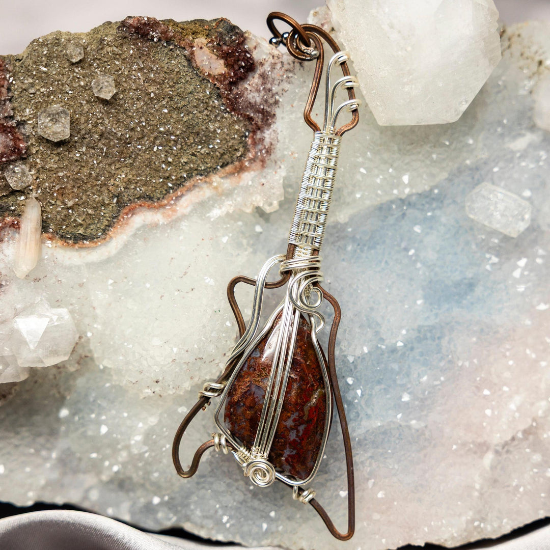 Pietersite Copper Wire Wrapped Guitar Pendant Necklace with swirling golds, blues, and browns for vision and transformation.