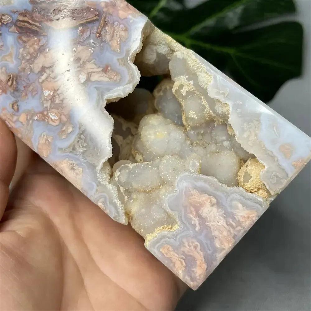 Pink Agate geode crystal tower from Crystal Destiny, showcasing sparkling druzy and soft pink/white banding.