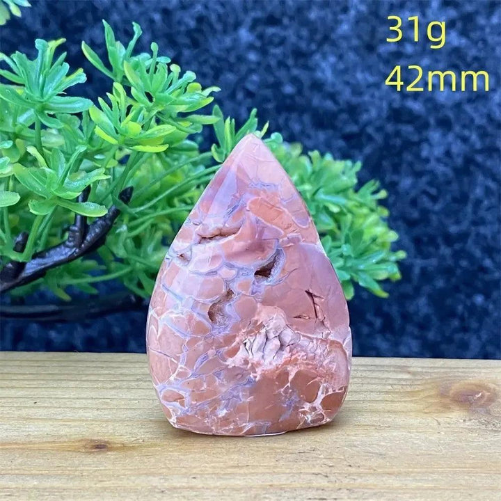 Pink Agate Geode torch specimen from Crystal Destiny, showing blush and cream banding, 31g, 42mm.