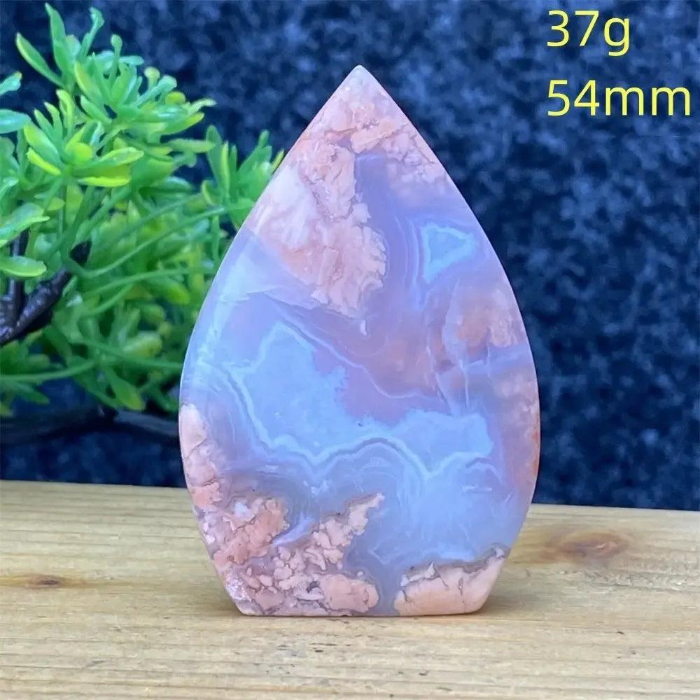 Hand-polished Pink Agate geode torch from Crystal Destiny, showcasing blush, cream, and dusty rose banding.