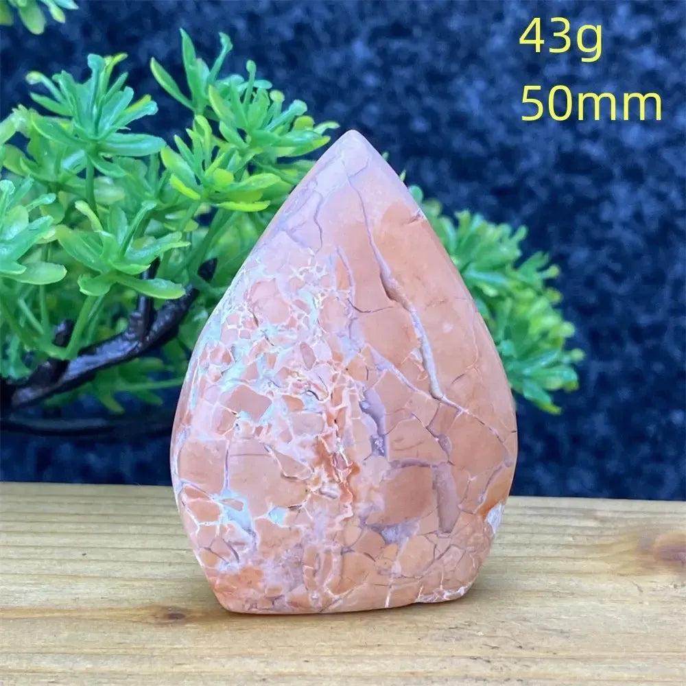 Crystal Destiny's 43g, 50mm hand-polished Pink Agate geode torch for emotional balance and self-love.