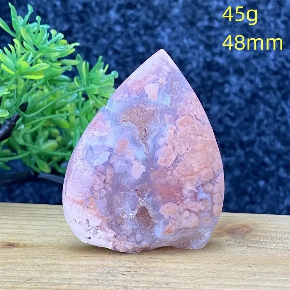 Hand-polished Pink Agate geode torch from Crystal Destiny, showcasing blush and cream layers for emotional balance.
