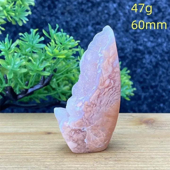 Hand-polished pink agate geode torch from Crystal Destiny, 60mm, 47g, showcasing natural blush and cream banding.