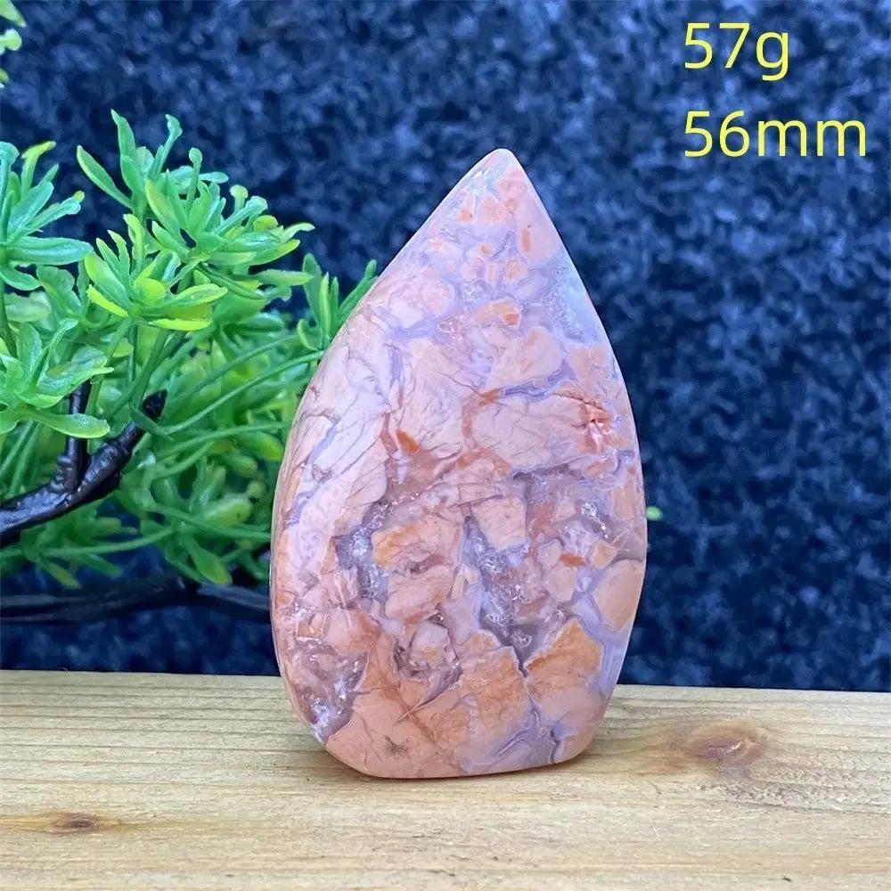 Crystal Destiny's hand-polished pink agate geode specimen, a 57g, 56mm torch for emotional balance.