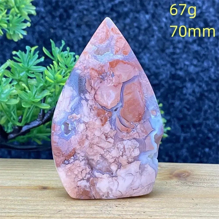 Hand-polished Pink Agate geode torch from Crystal Destiny, showcasing blush, cream, and dusty rose banding.