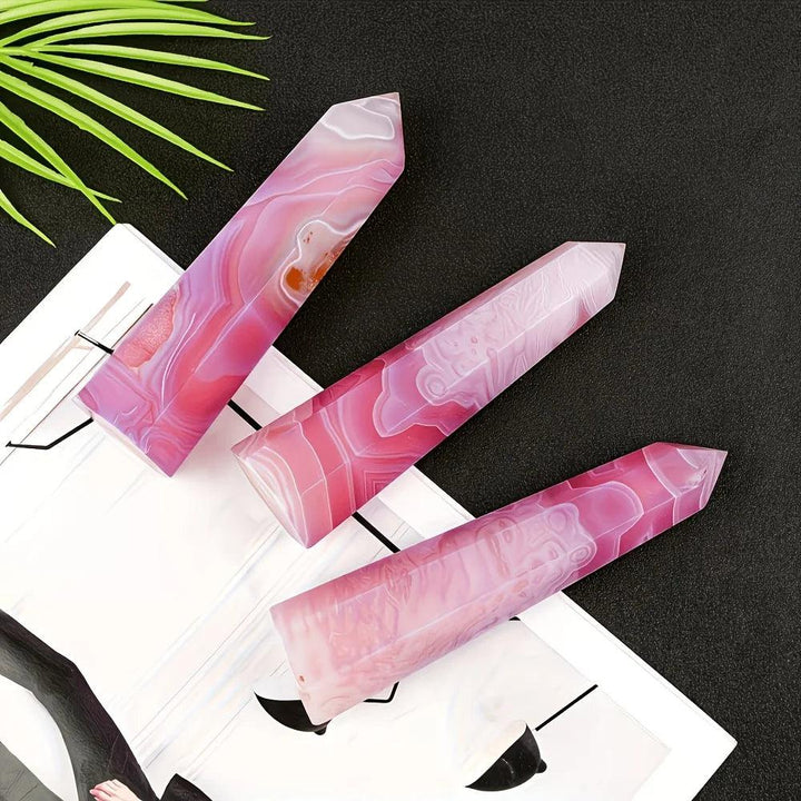 Three pink agate crystal pillars with natural banding, perfect for healing and bohemian home decor.