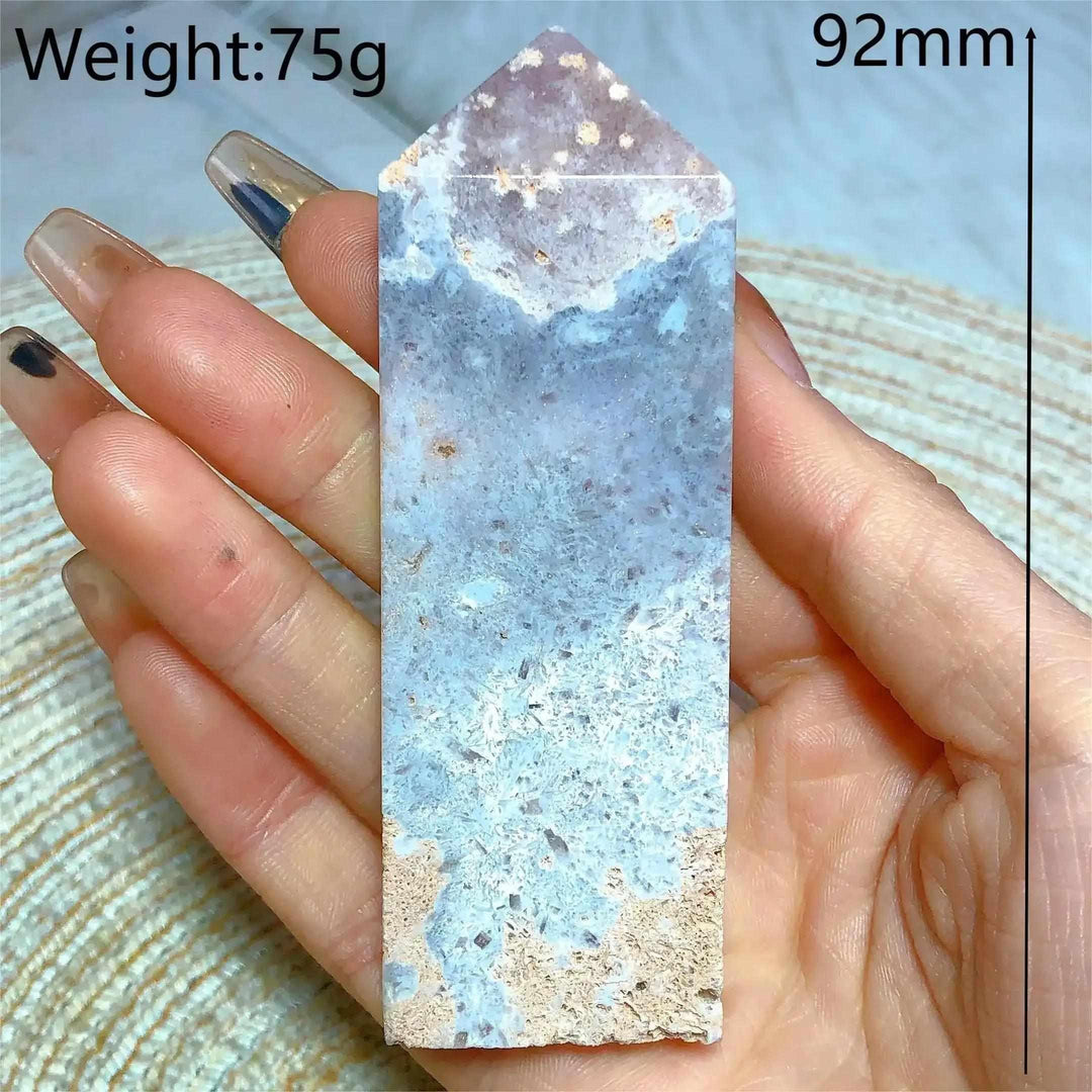 Hand-polished Pink Amethyst Druzy Tower with soft lavender quartz, sparkling crystal pockets, and a faceted point.