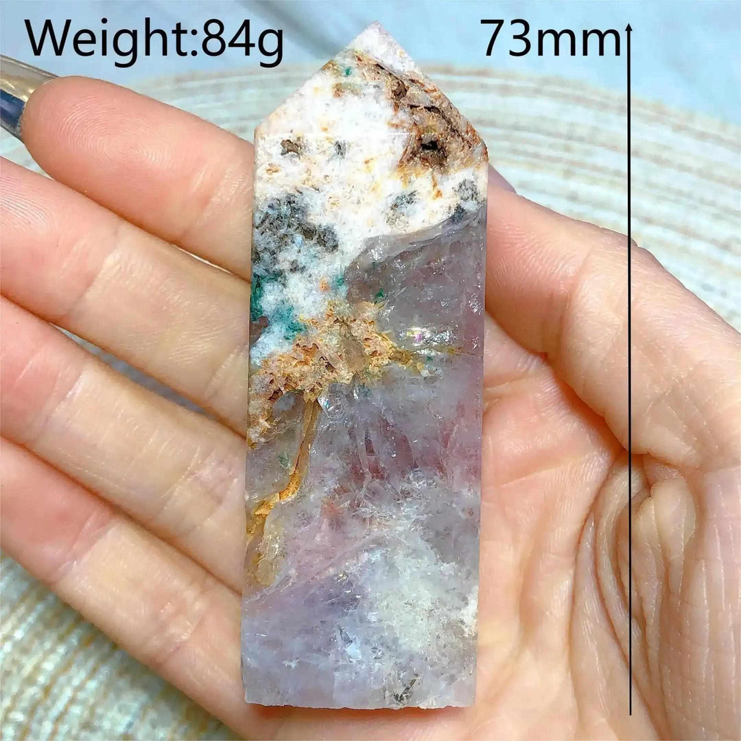 Hand-held Pink Amethyst Druzy Tower featuring soft lavender quartz, white banding, and sparkling crystal pockets.