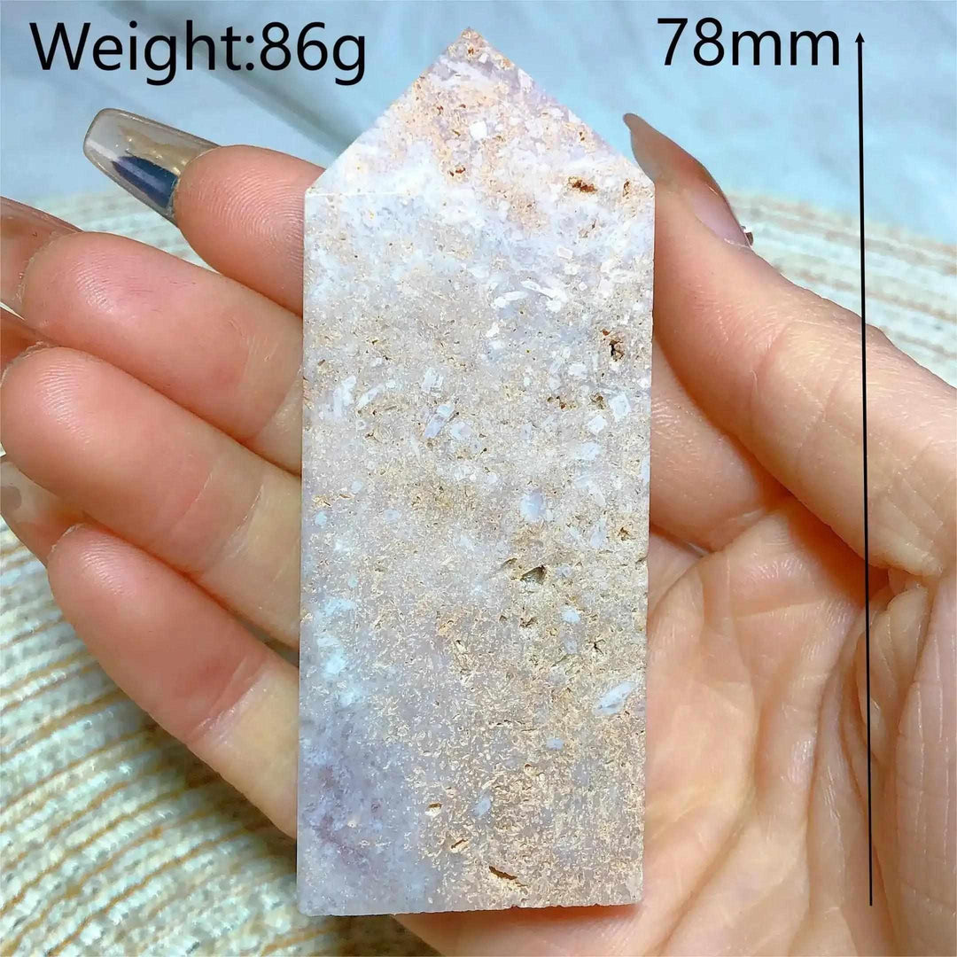 Hand-polished Pink Amethyst Druzy Tower with soft lavender quartz, sparkling crystal pockets, and a faceted point.