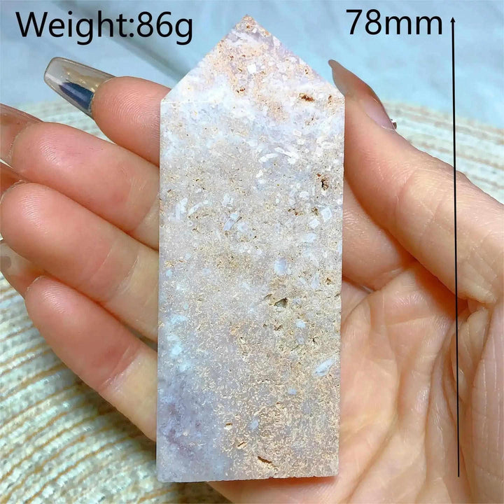 Hand-polished Pink Amethyst Druzy Tower with soft lavender quartz, sparkling crystal pockets, and a faceted point.