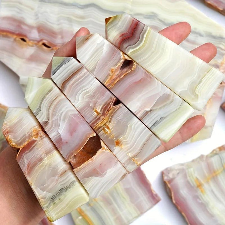 Pink Banded Calcite Crystal Towers with soothing pink, peach, and cream layers for heart healing.