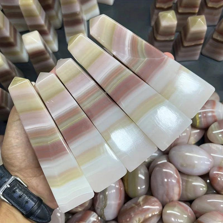 Pink Banded Calcite Crystal Towers with soothing pink and peach layers for heart healing.