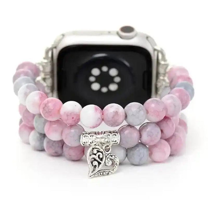 Pink Jasper Beaded Apple Watch Band with natural rosy stones, promoting love and emotional balance. Features a silver heart charm.