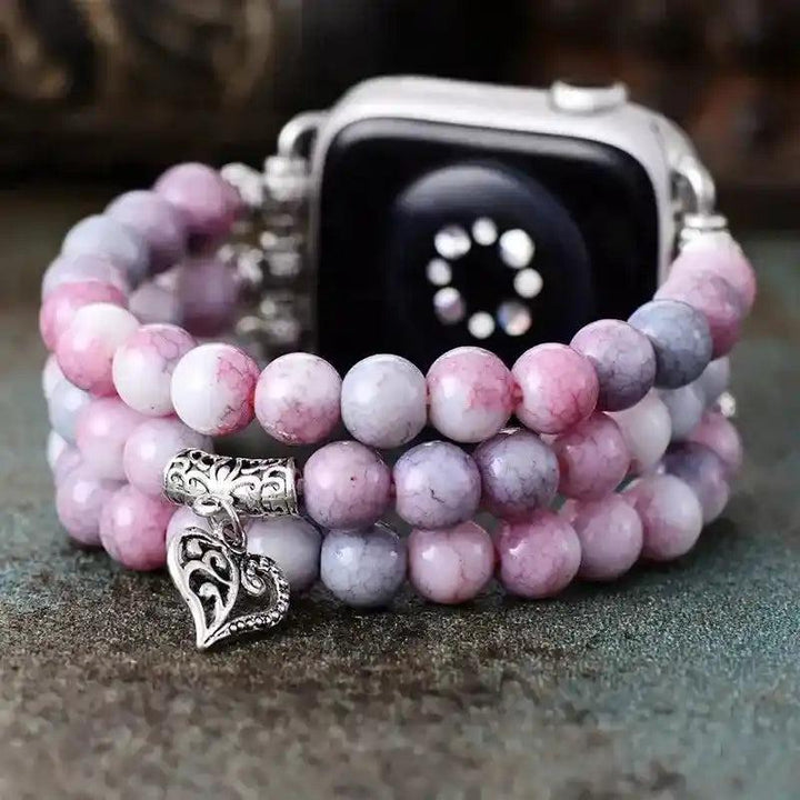 Pink Jasper Beaded Apple Watch Band with natural rosy stones, promoting love and emotional balance. Features a silver heart charm.