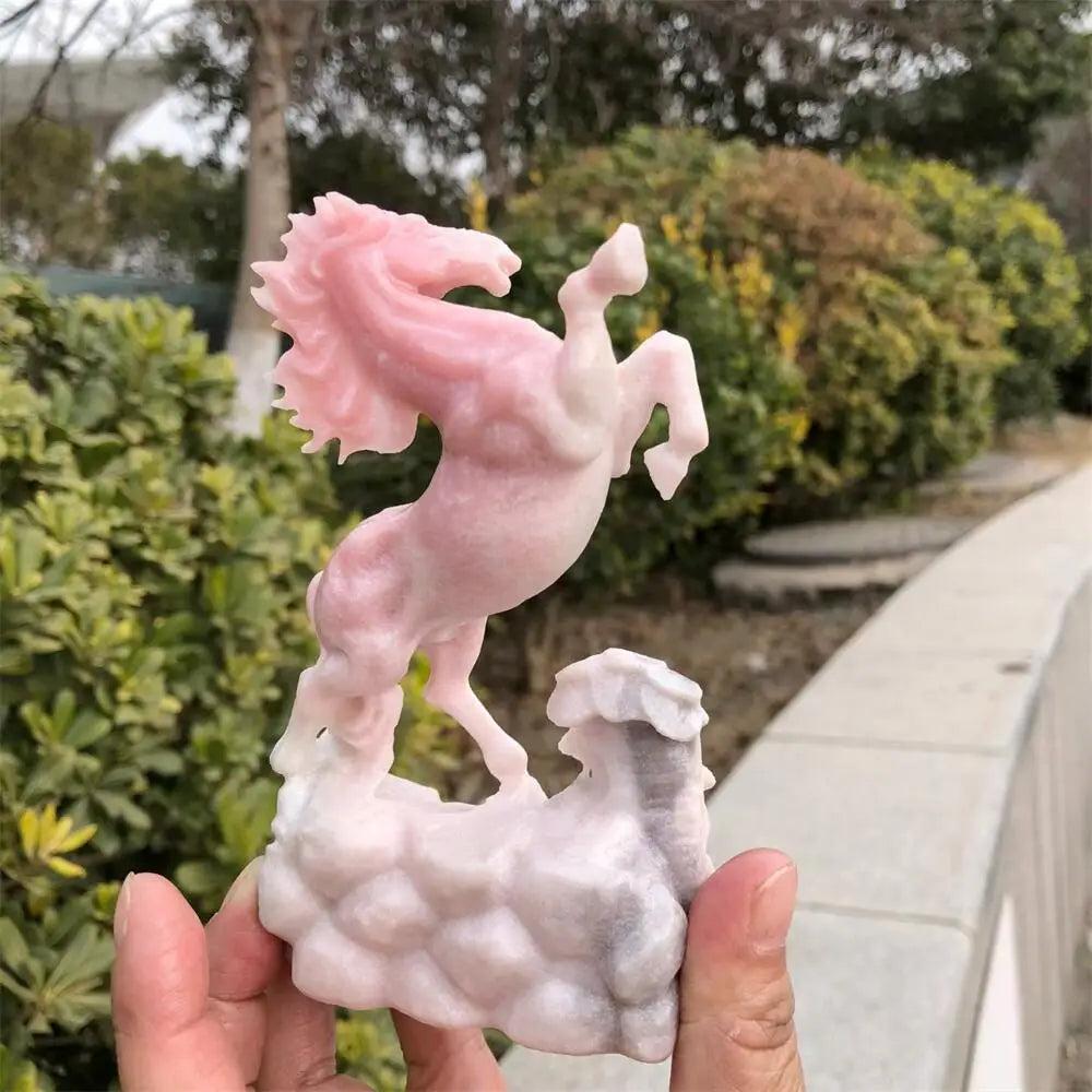 Hand-carved pink opal horse statue with a luminous finish, perfect for heart-centered healing and peaceful energy.
