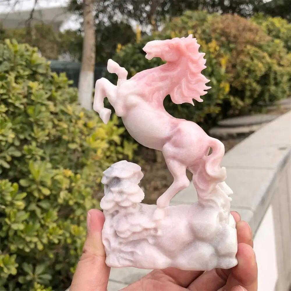 Hand-carved pink opal horse statue with a smooth, luminous finish for heart-centered healing and peaceful energy.