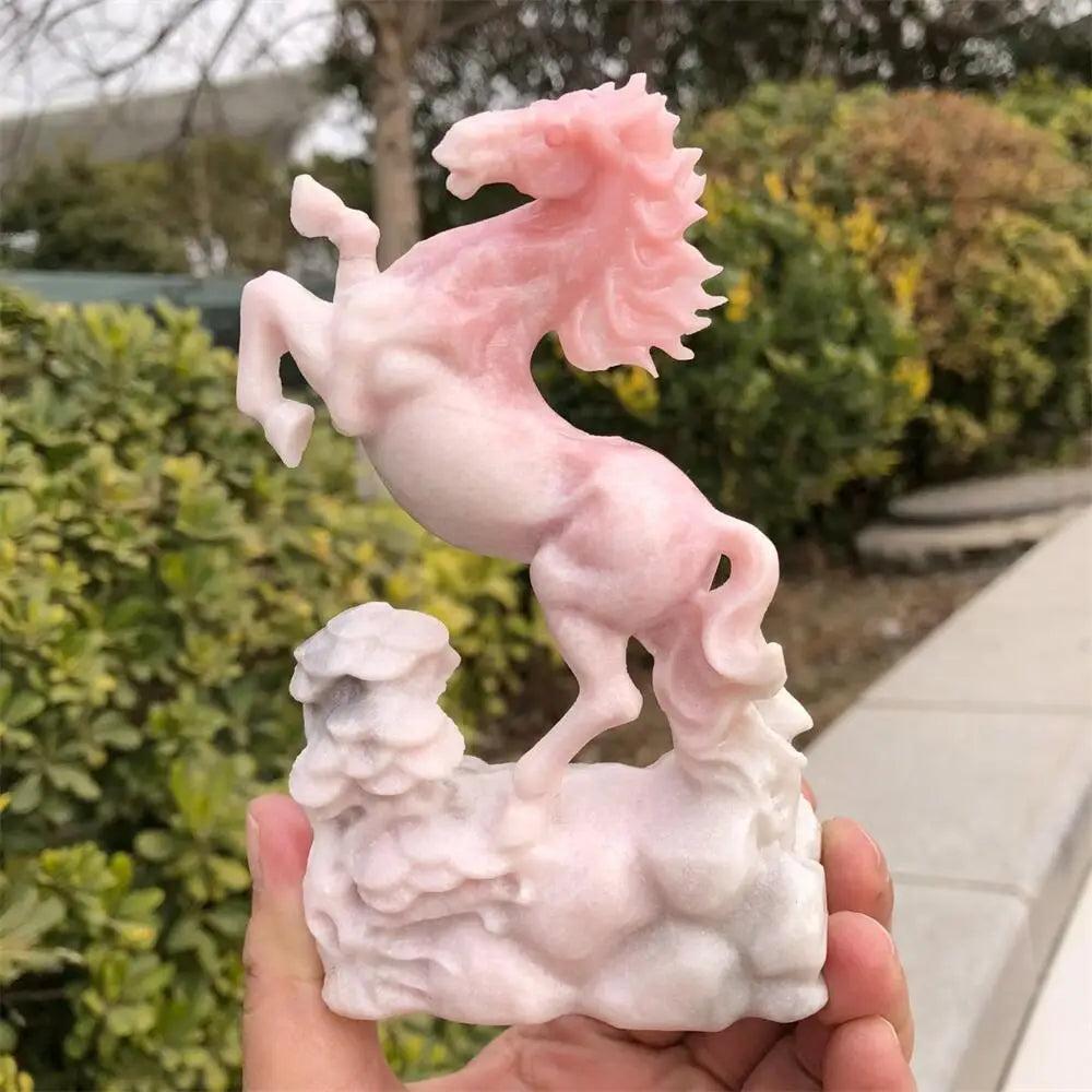 Hand-carved pink opal horse statue with a luminous finish, perfect for heart-centered healing and peaceful energy.