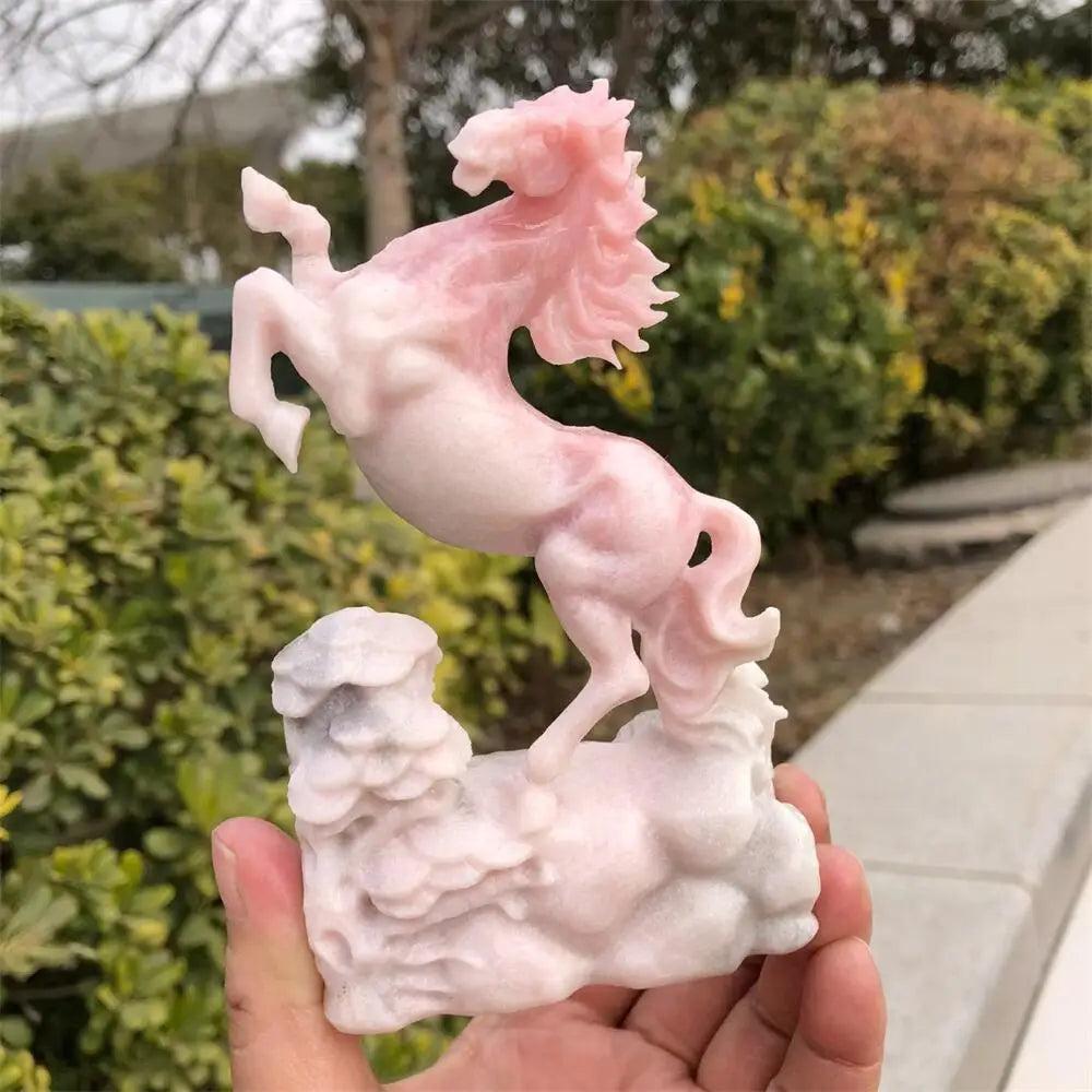 Hand-carved pink opal horse statue with a smooth, luminous finish, perfect for Heart Chakra healing and calm energy.