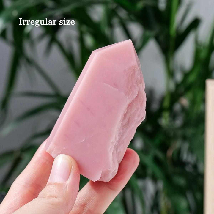 Polished bubblegum pink opal tower with a natural, irregular shape for heart chakra healing and gentle emotional calm.