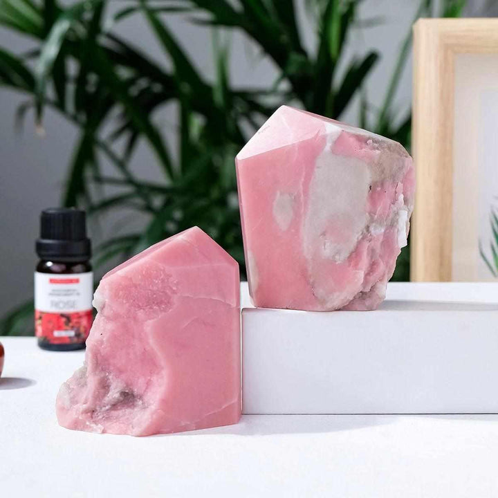 Polished bubblegum pink opal tower for heart chakra healing, featuring a natural, irregular crystal point design.