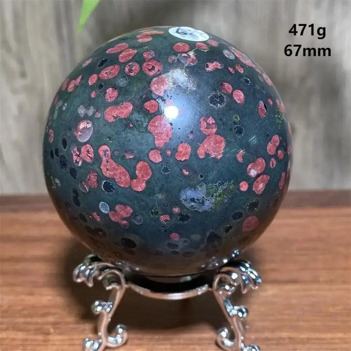 Plum Blossom Jade crystal sphere by Crystal Destiny, 471g, 67mm, with dark green and red floral patterns.