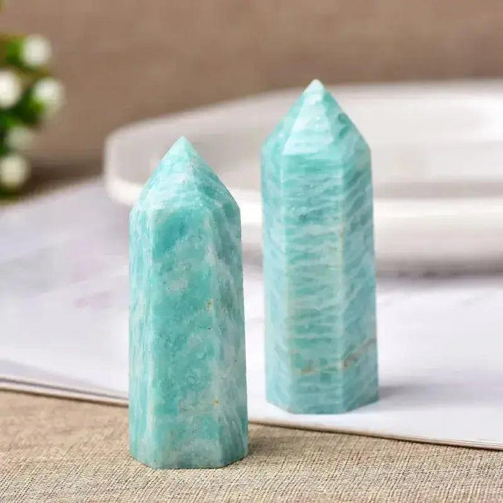 Two polished Amazonite Crystal Towers, showcasing unique blue-green hues, perfect for energy work and décor.