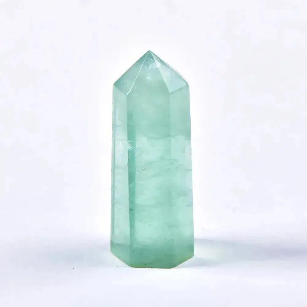 Polished green fluorite crystal tower, ideal for chakra balancing and spiritual practice.