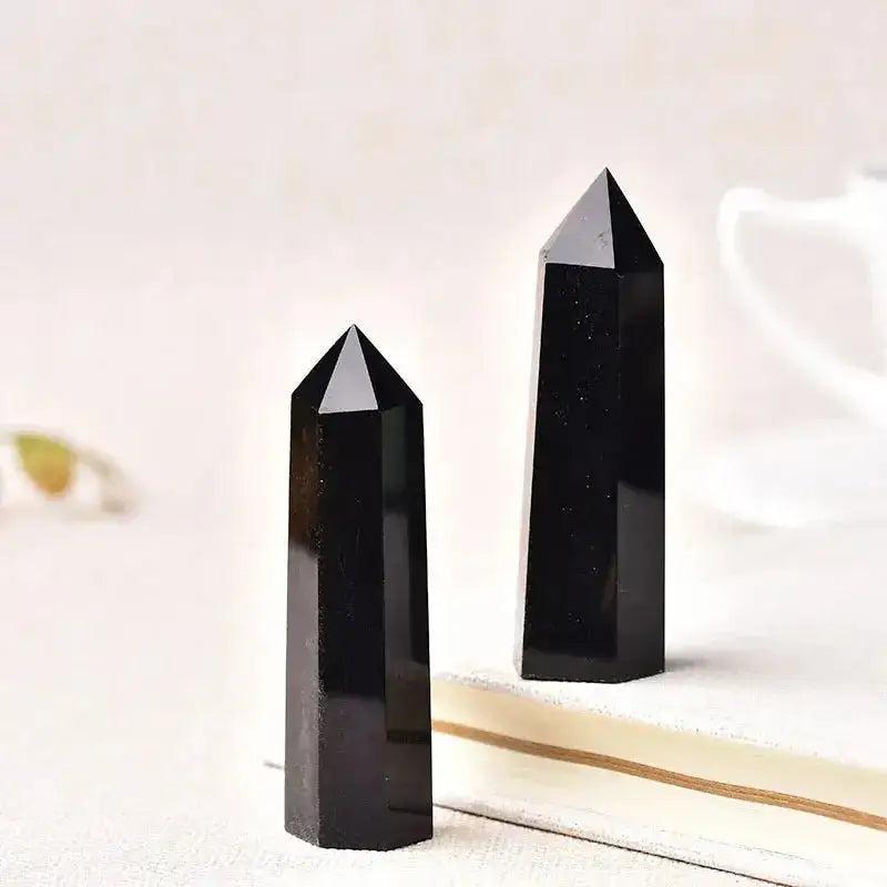 Two polished black obsidian crystal towers, perfect for grounding, protection, and amplifying energy.