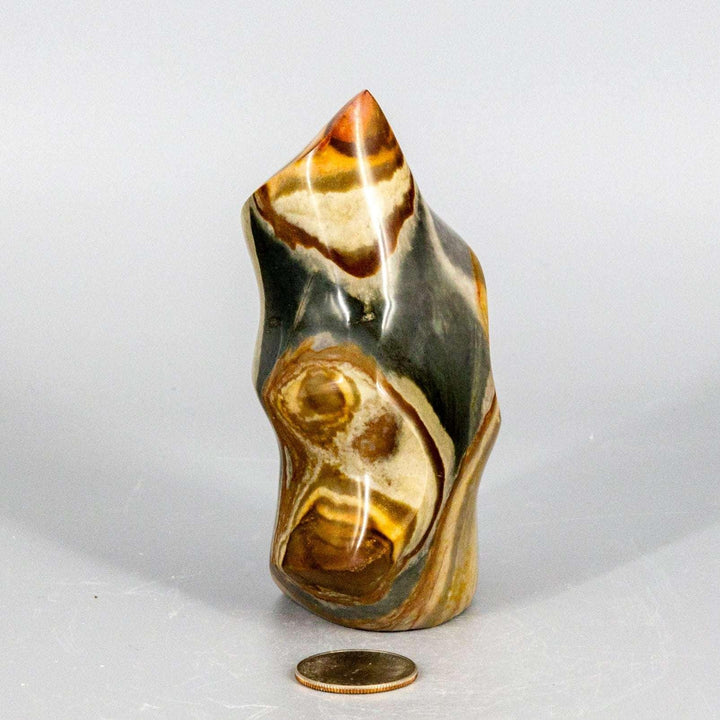 Premium Polychrome Jasper Flame with earthy reds, oranges, browns, and creamy whites in flowing, organic patterns.
