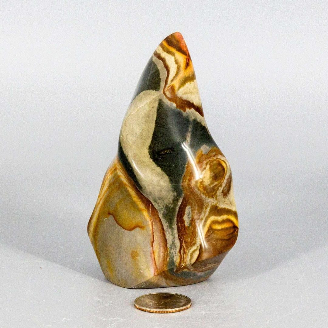 Premium Polychrome Jasper Flame with earthy reds, oranges, browns, and creamy whites in flowing patterns.