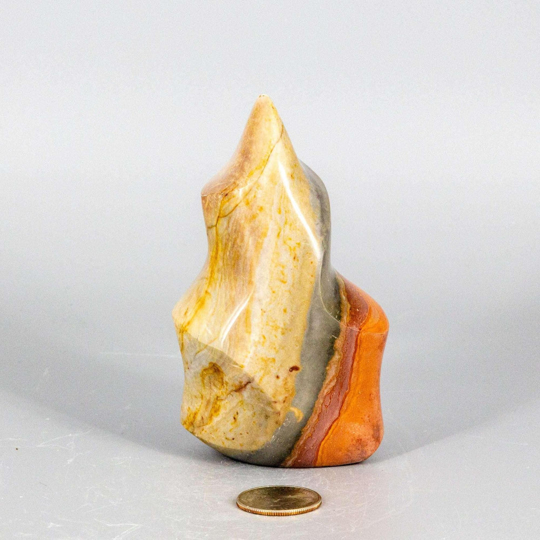 Premium Polychrome Jasper Flame, showcasing earthy reds, oranges, browns, and creamy whites in a dynamic, polished form.