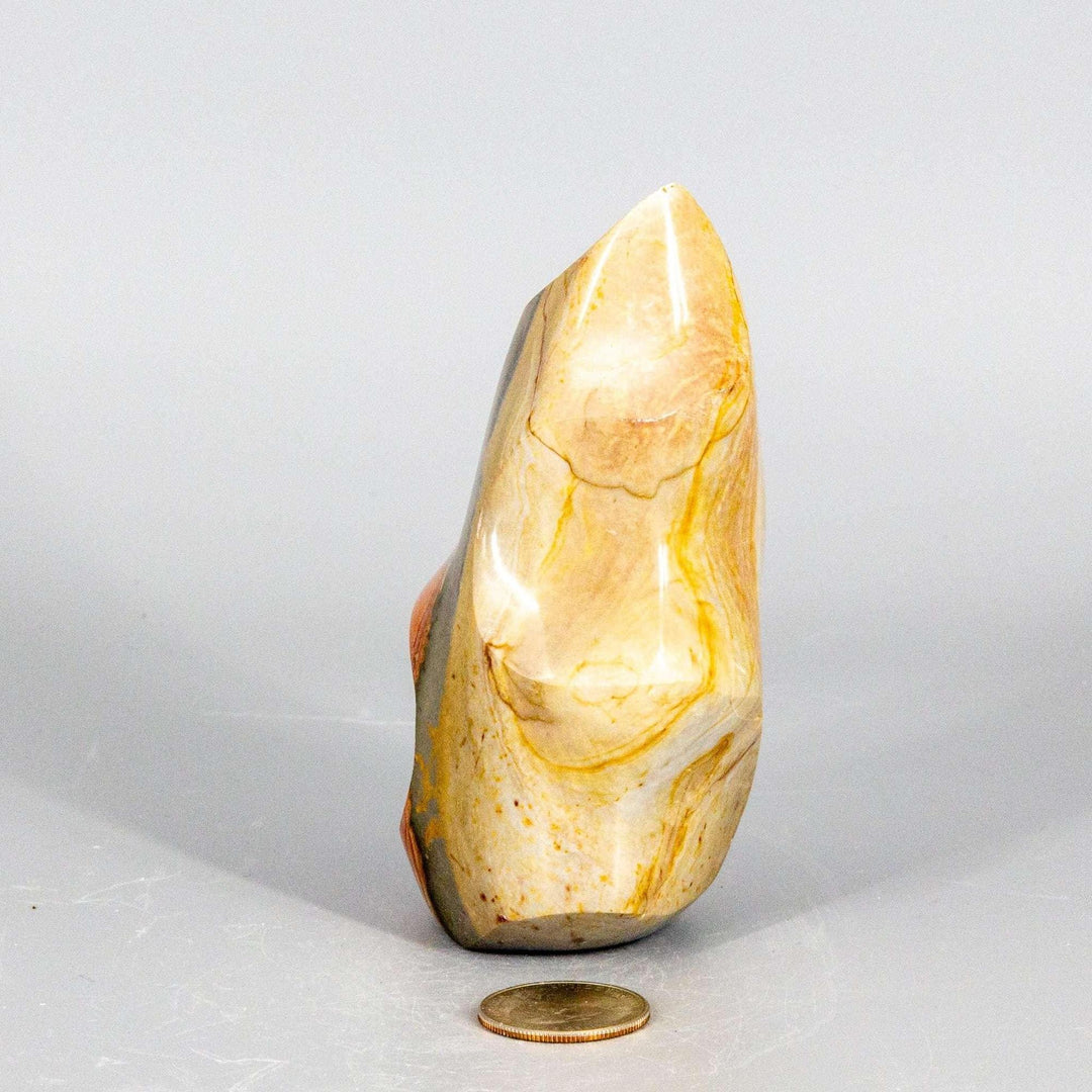 Premium Polychrome Jasper Flame, showcasing earthy reds, oranges, and creamy whites in flowing, dynamic patterns.