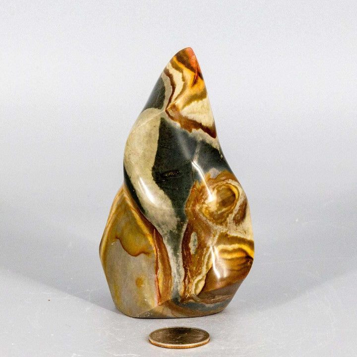 Premium Polychrome Jasper Flame, showcasing earthy reds, oranges, browns, and creamy whites in a dynamic, polished form.